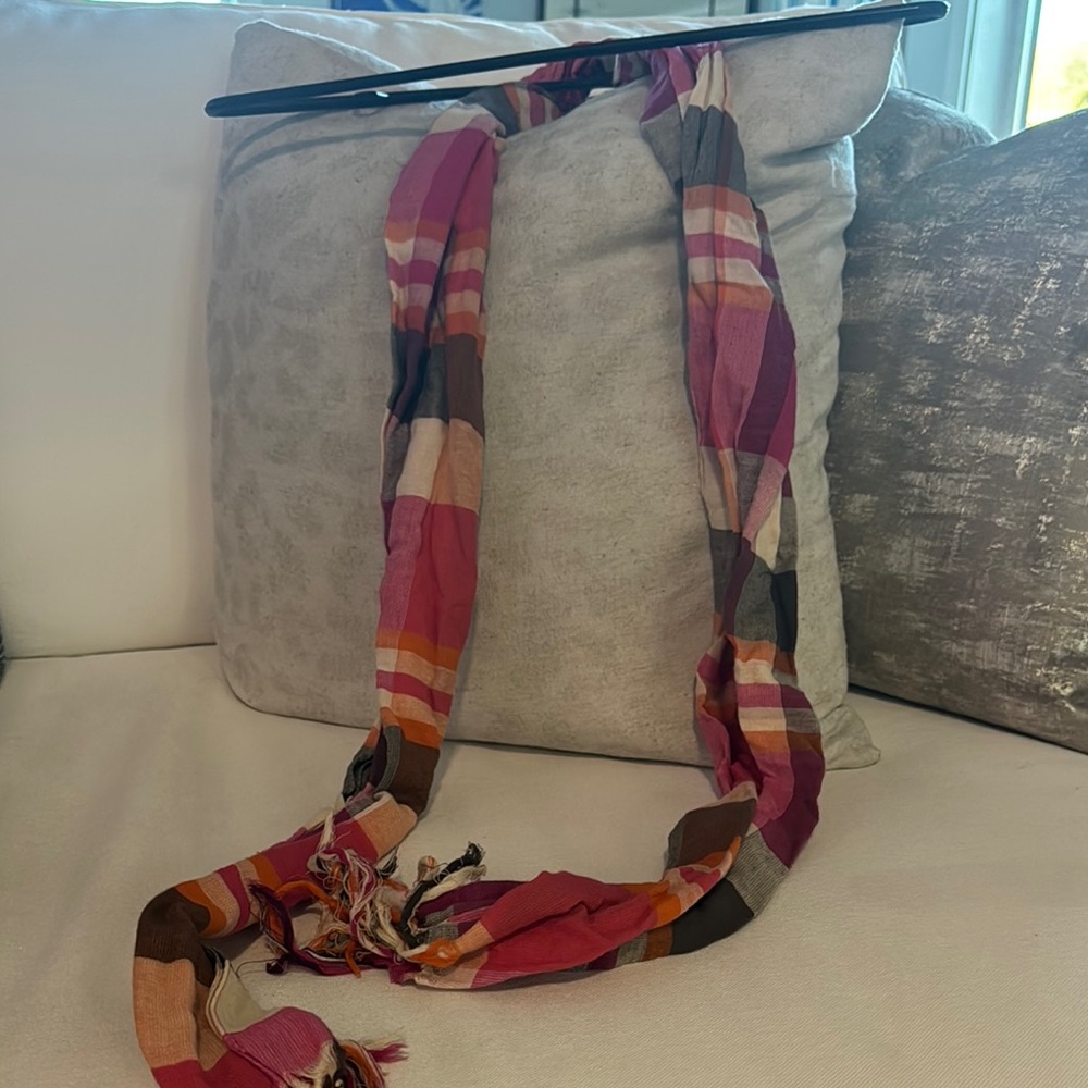 Multi colored box striped scarf.